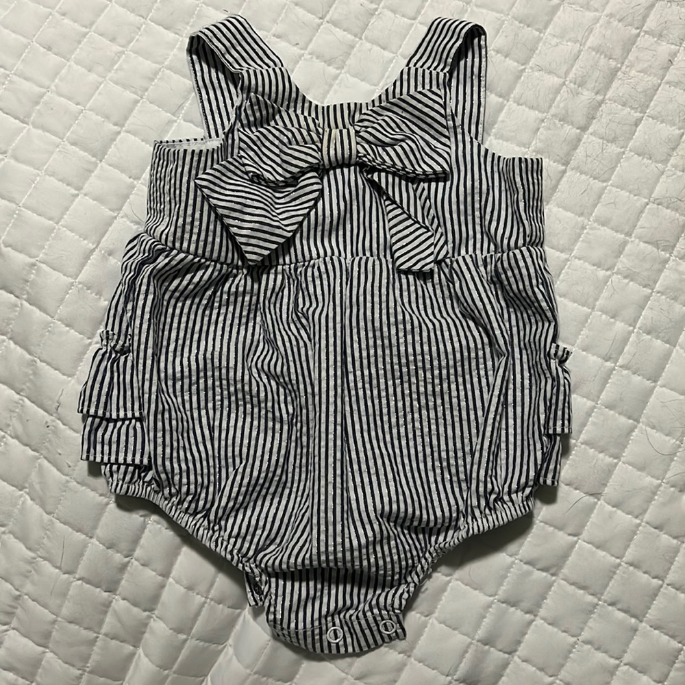 Rare Edition 0-3 month girls one piece. White with blue and sparkly silver